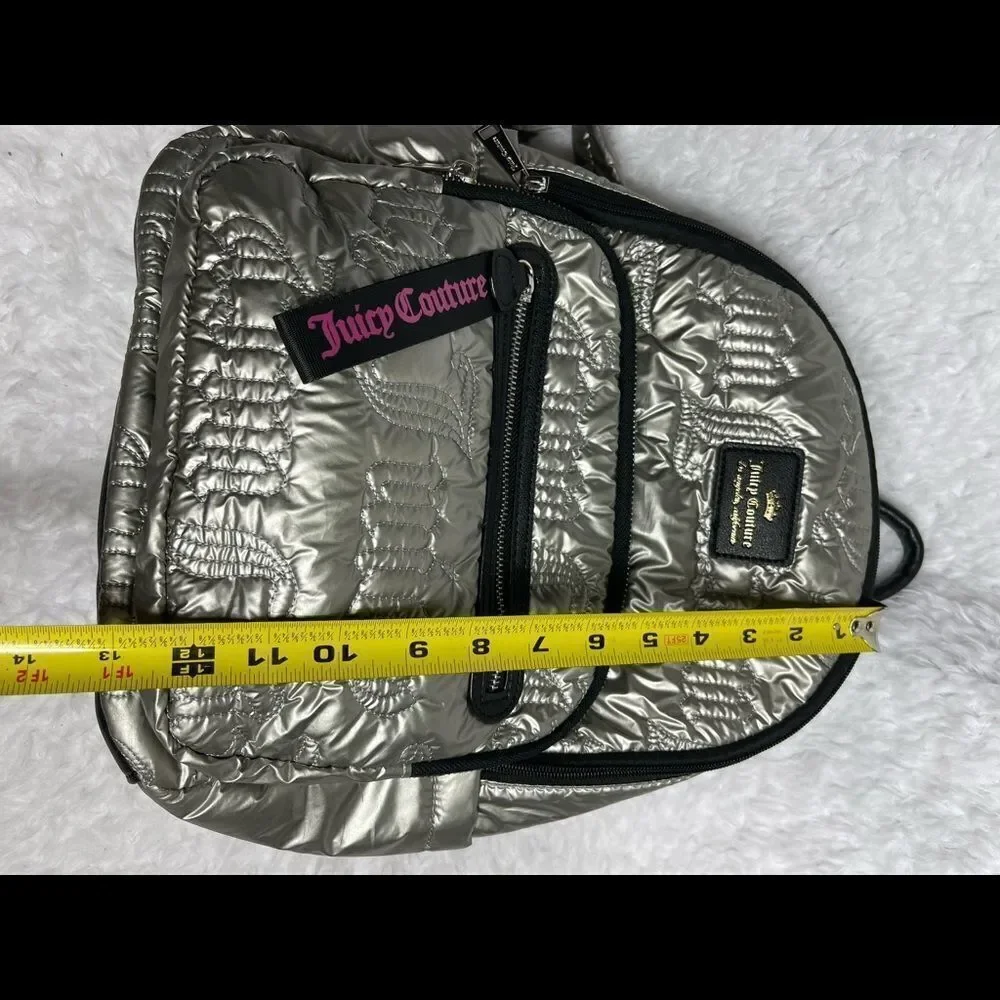 Juicy Couture Metallic quilted silver Backpack with black trim. - Picture 8 of 16